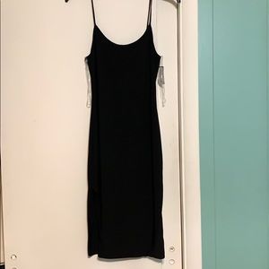 Black slinky spandex dress with slit